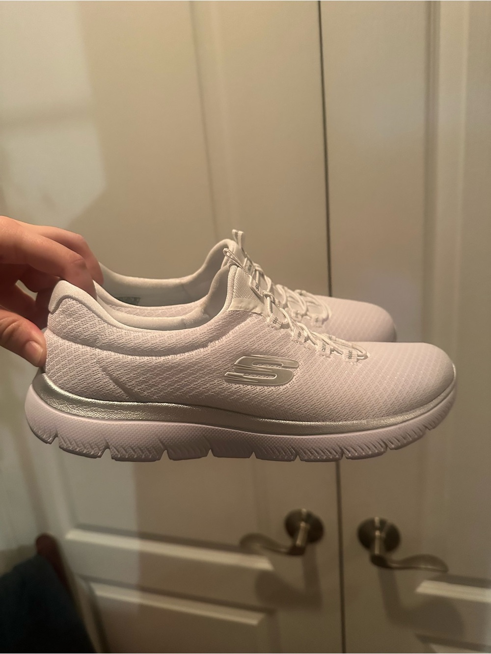 Skechers Women’s White Slip-On Knit Athletic Sneakers with Silver Accent